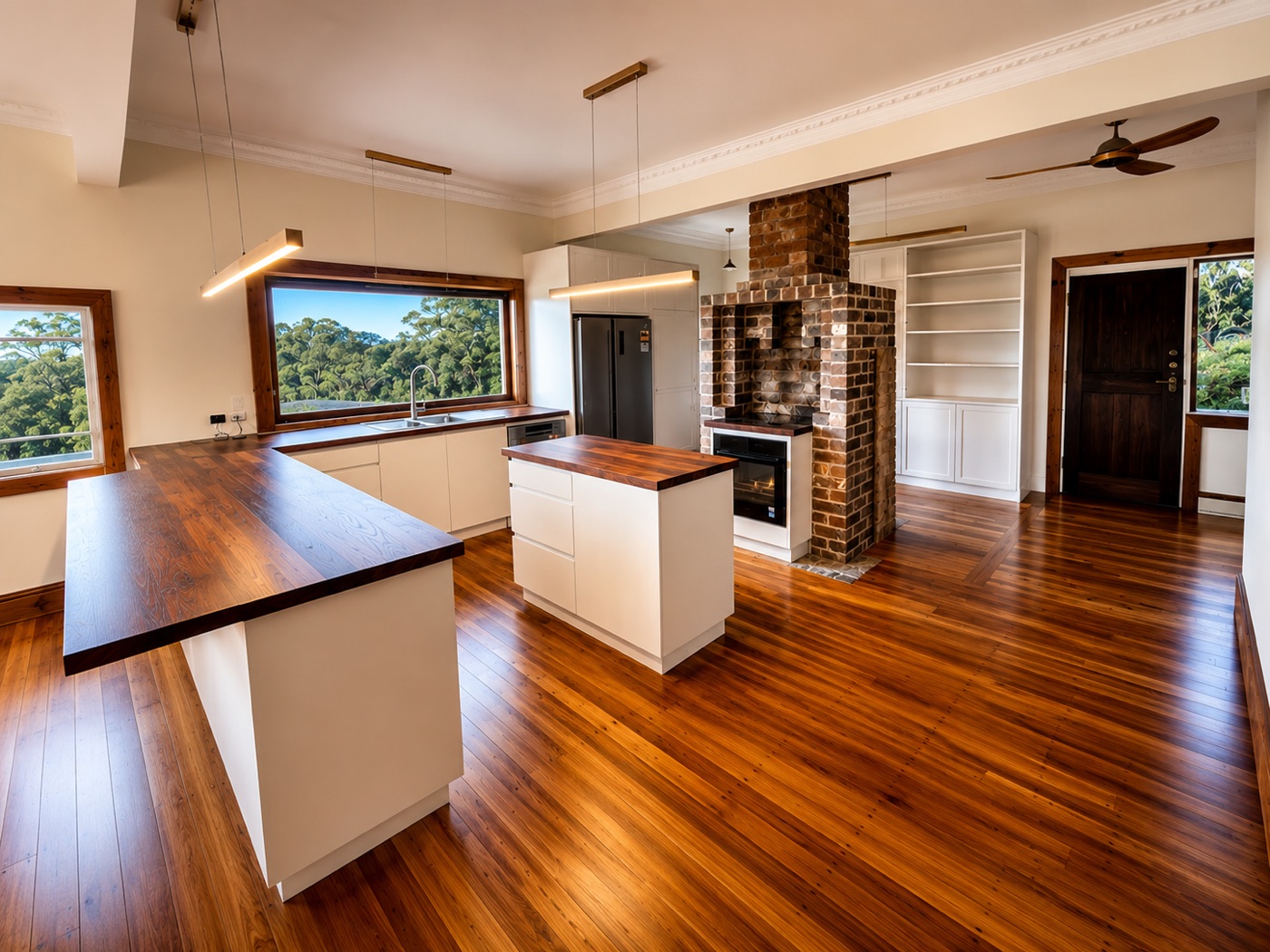 Renovated kitchen with exposed brick chimney