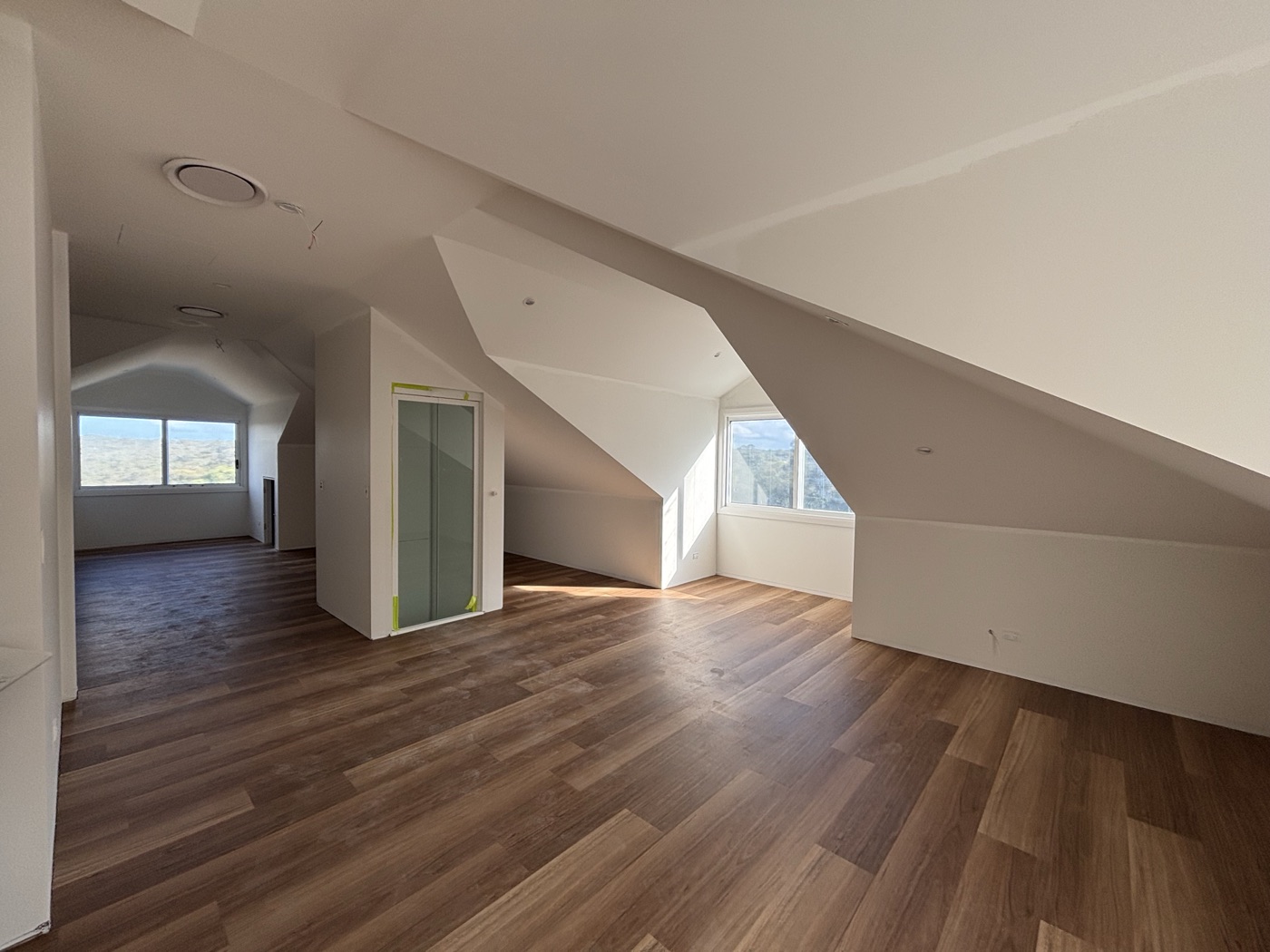 Renovated loft study with timber flooring