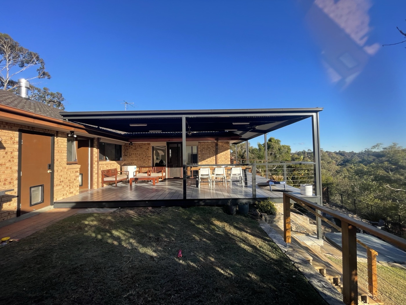 Pergola over deck with bushland view